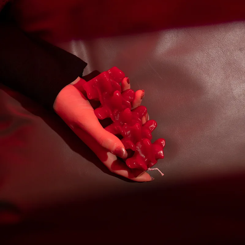 spine bones red candles
