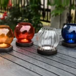 red glass hurricane candle holders