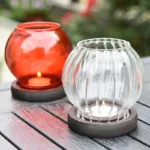 red glass hurricane candle holders