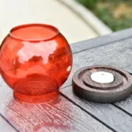 red glass hurricane candle holders