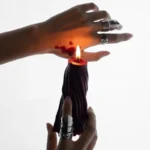 ripple-textured black pillar candle